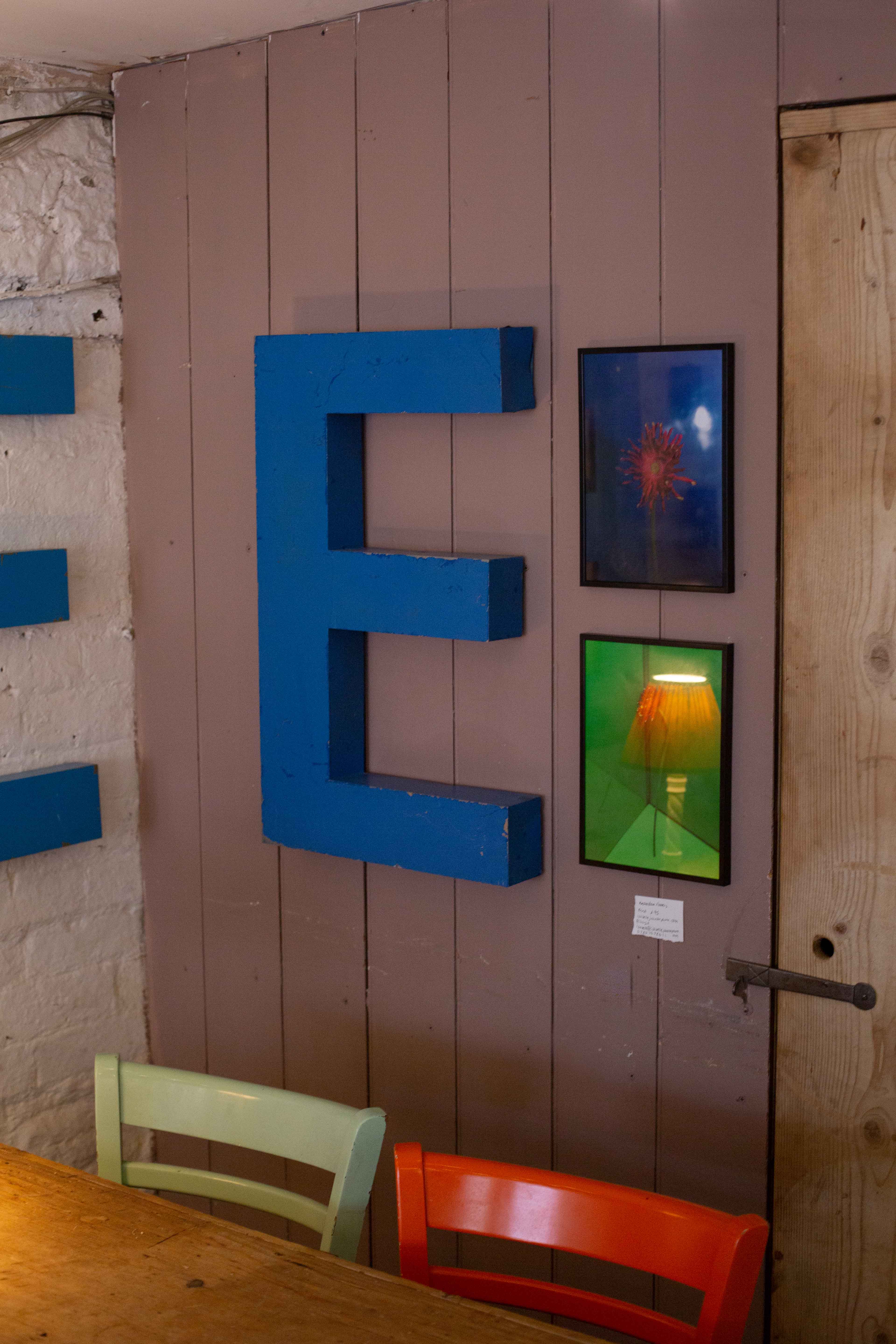 flowers on wall in cafe